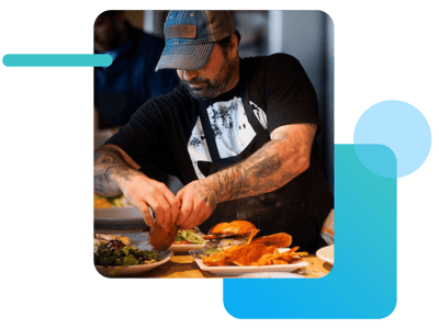 Restaurant chef plating food