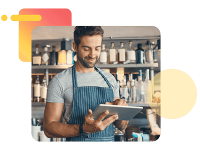 Restaurant employee using operations software on a tablet