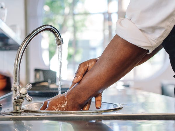 Restaurant Worker Washing Hands