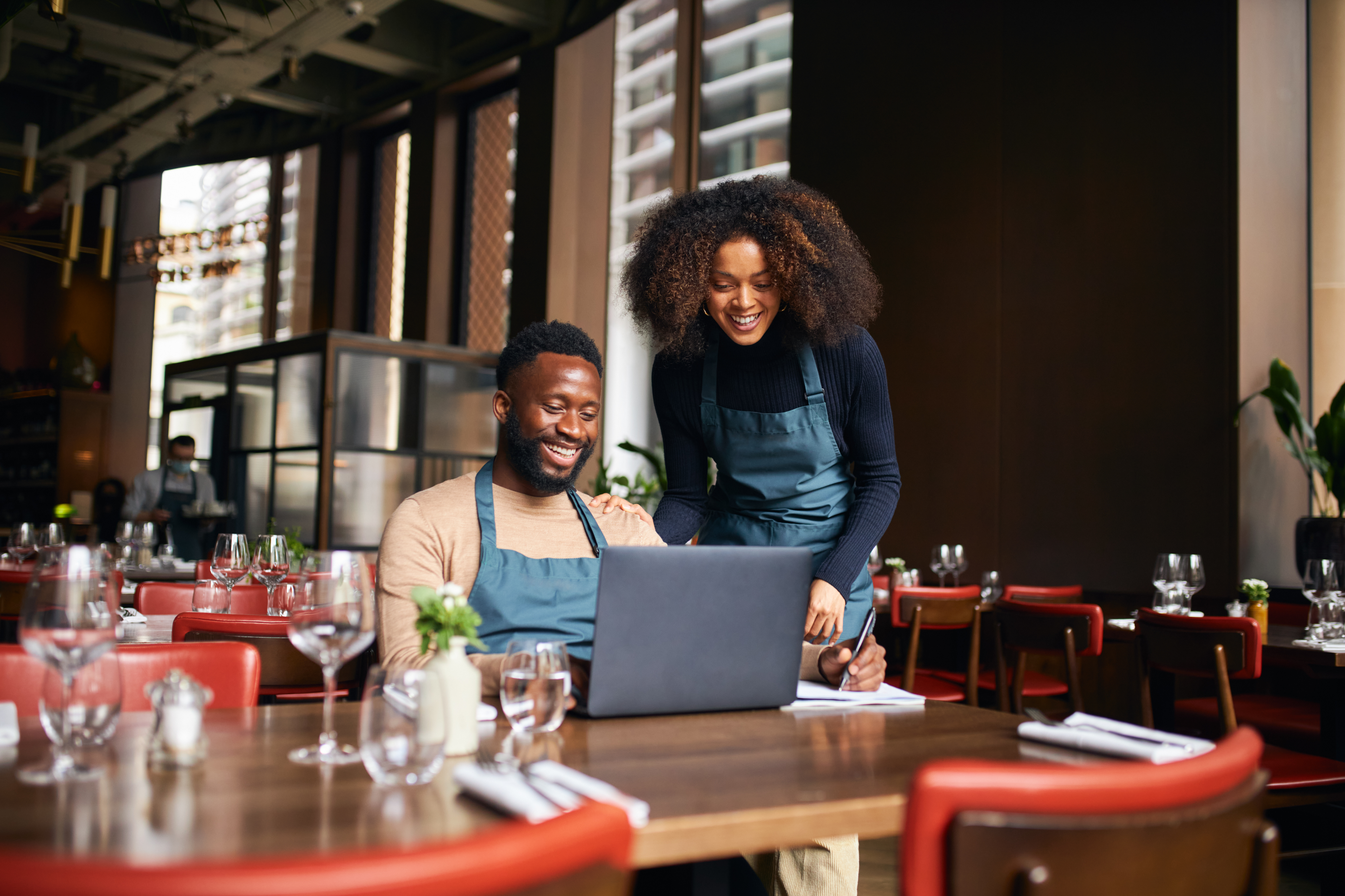 Restaurant Managers Using Restaurant Management Software