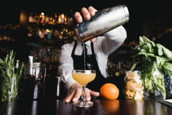 bar tender pouring drink