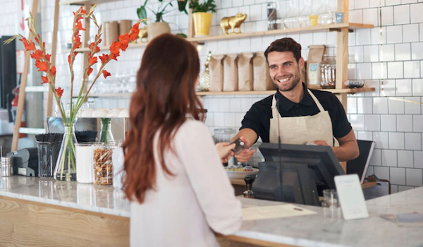 Restaurant Worker Serving Customer