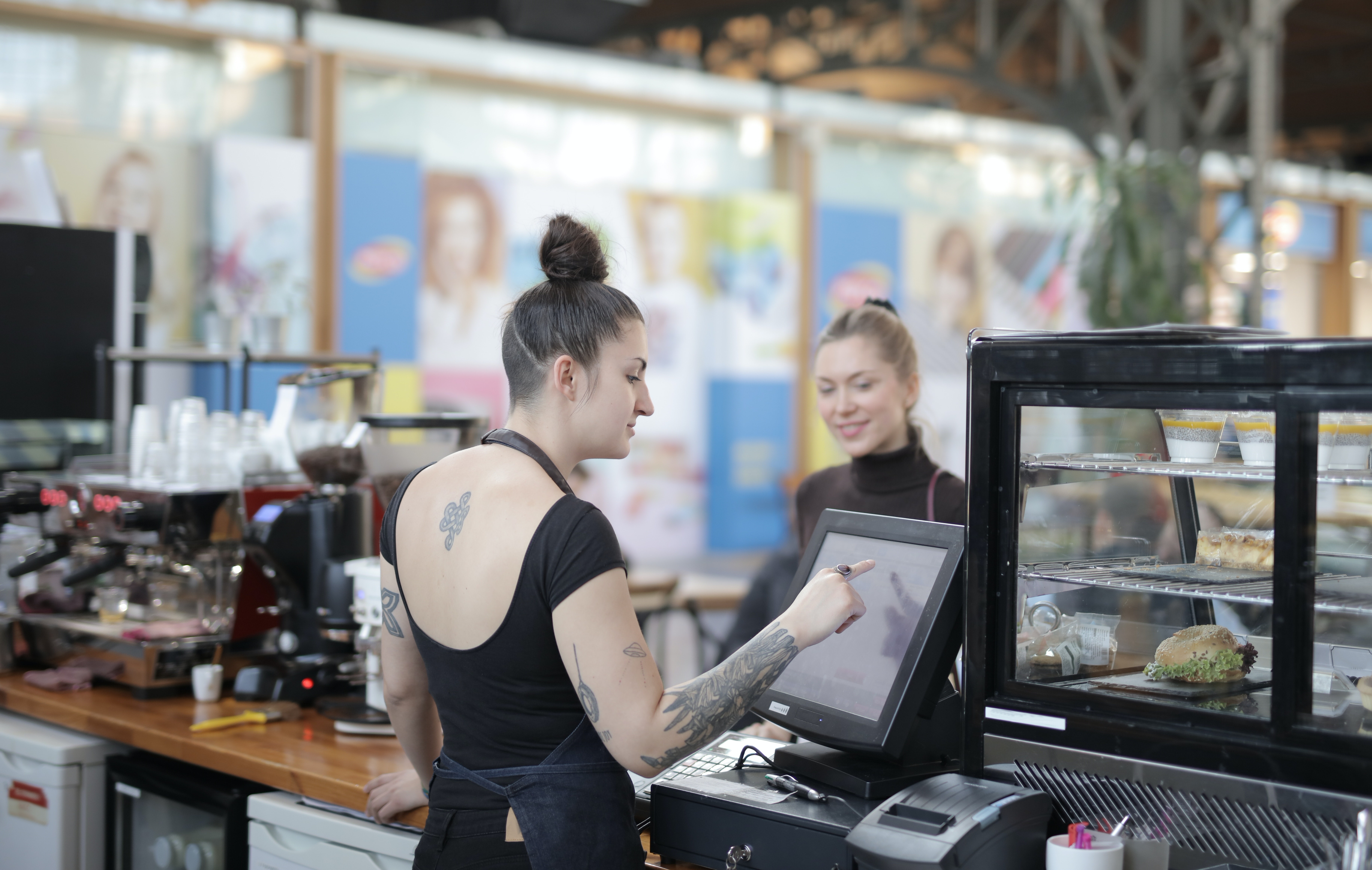 Restaurant worker using restaurant technology