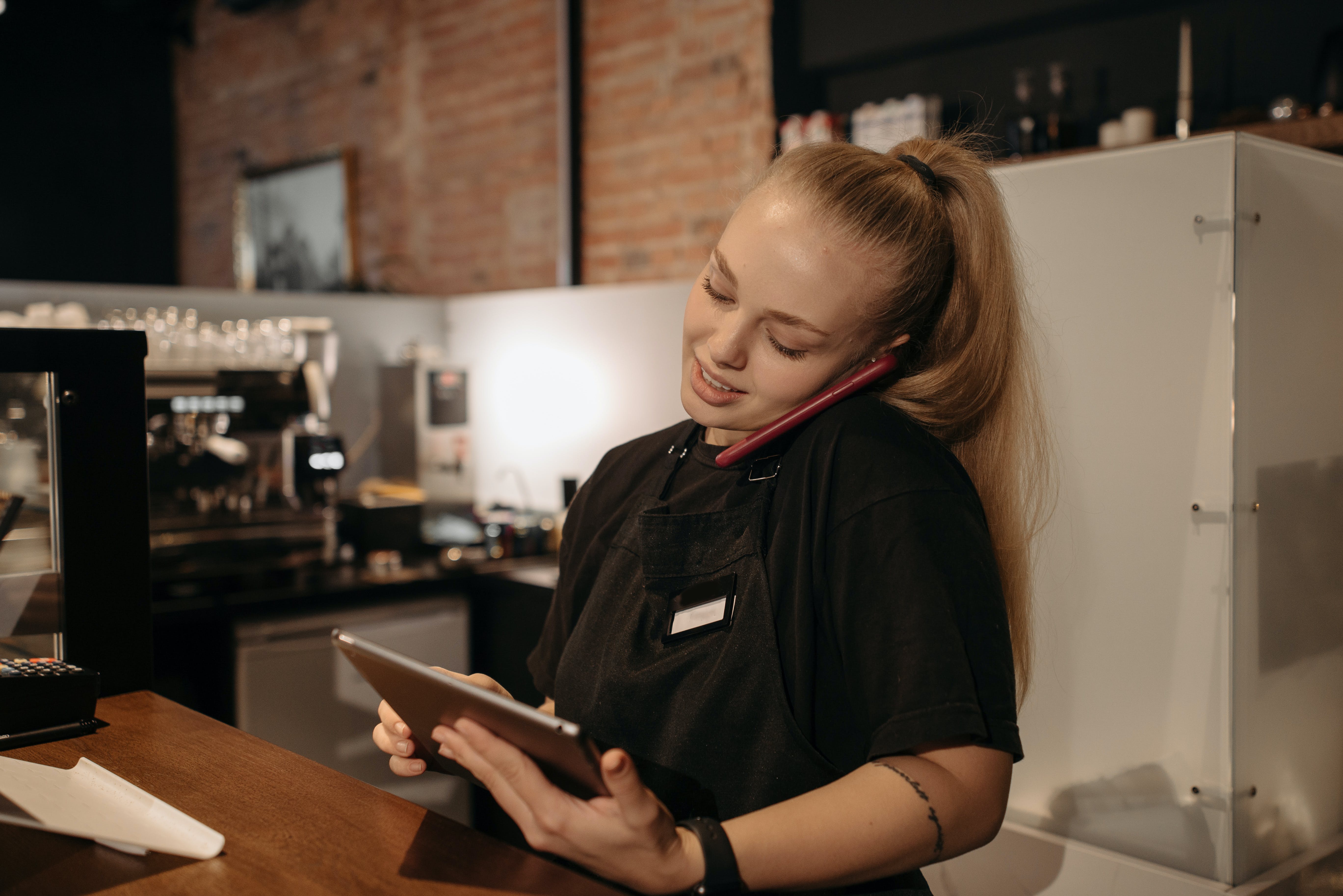 restaurant employee on ipad preventing pencil whipping